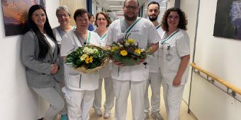 Das Bild zeigt das Team der Palliativstation bei der Eröffnung