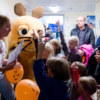 Ärztin, Kinder und die Maus