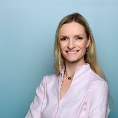 Das Bild zeigt ein Porträt von Geschäftsführerin Dr. Linda Rasche