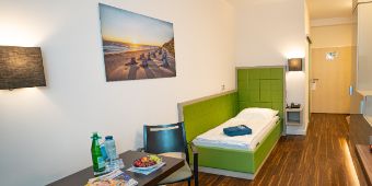 Komfortables Einzelzimmer mit vielen Annehmlichkeiten Komfortables Einzelzimmer mit vielen Annehmlichkeiten