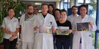 Die Jury mit den drei erstplatzierten Fotos. Die Jury mit den drei erstplatzierten Fotos.