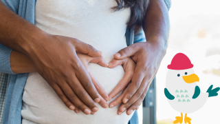 Pärchen freut sich auf die Geburt ihres Babys