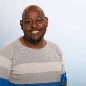Enock Muswizu, B. A.