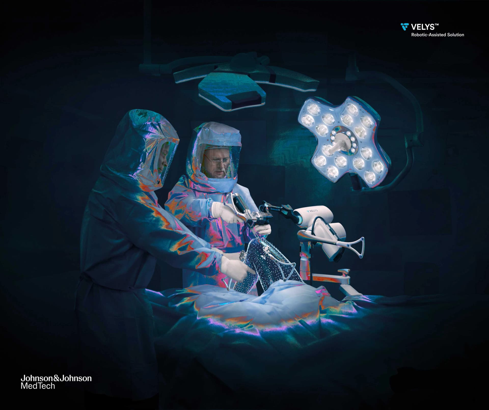 Das Motiv zeigt den Velys-Roboter und zwei Ärzte