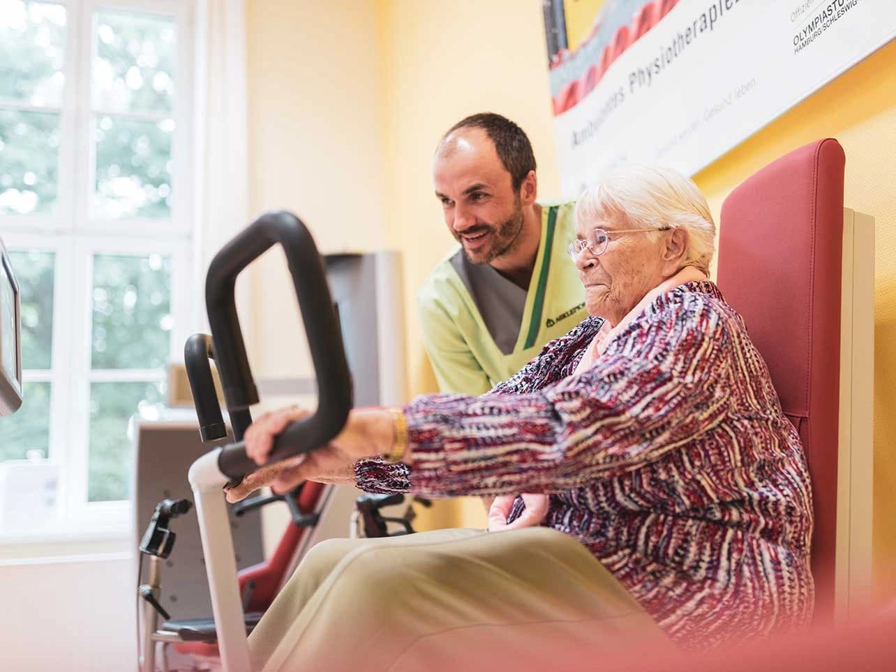 Bild: Physiotherapeut und Patientin