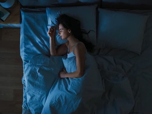 Bild: Frau im Bett