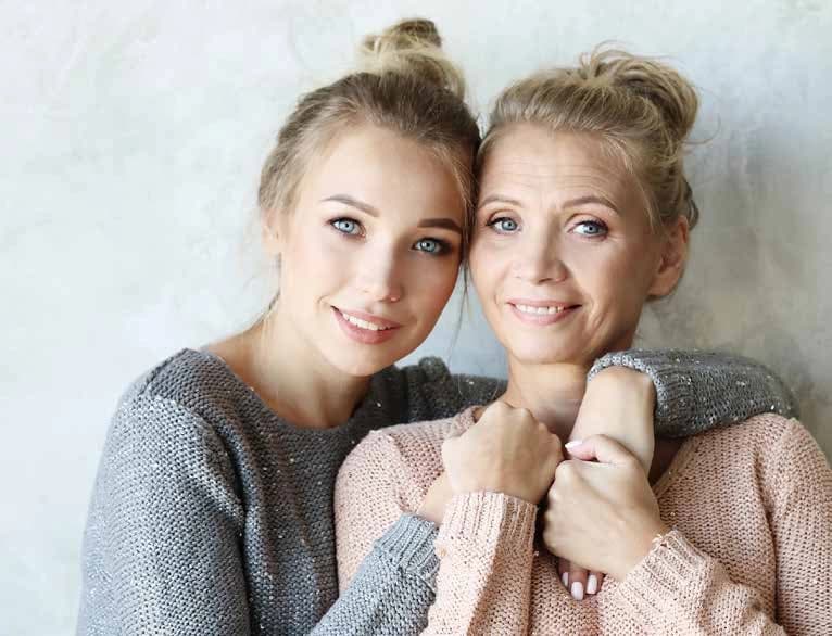 Das Motiv zeigt zwei Frauen, die sich umarmen