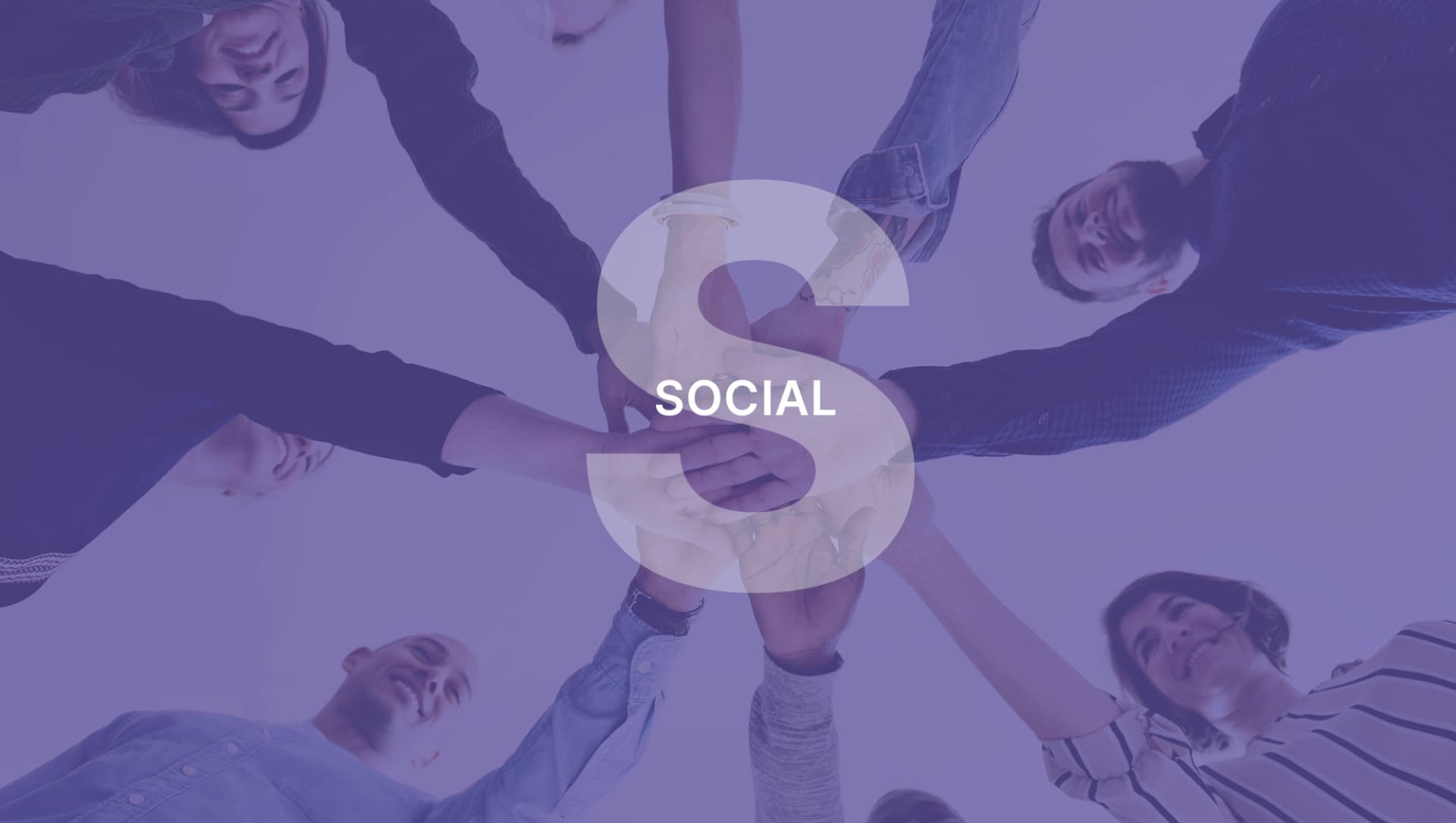 Picture: Group of people standing in a circle, smiling and placing their hands together in the center, with a large “S” and the word “SOCIAL” above them.